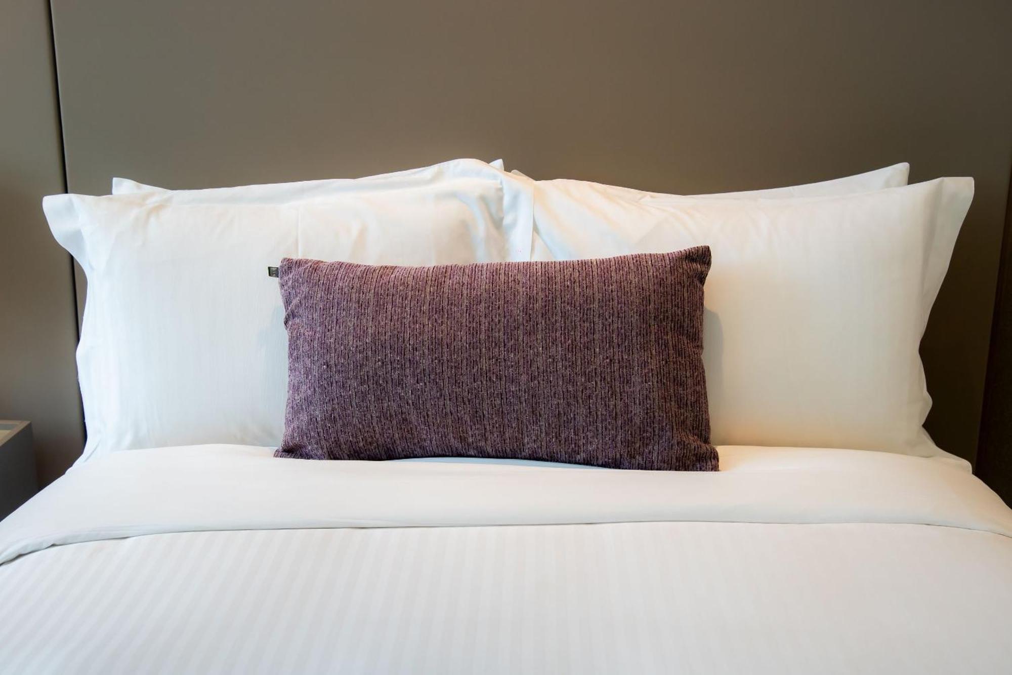 Camino Real Fashion Drive Monterrey Hotel San Pedro Garza Garcia Exterior photo A bed with pillows